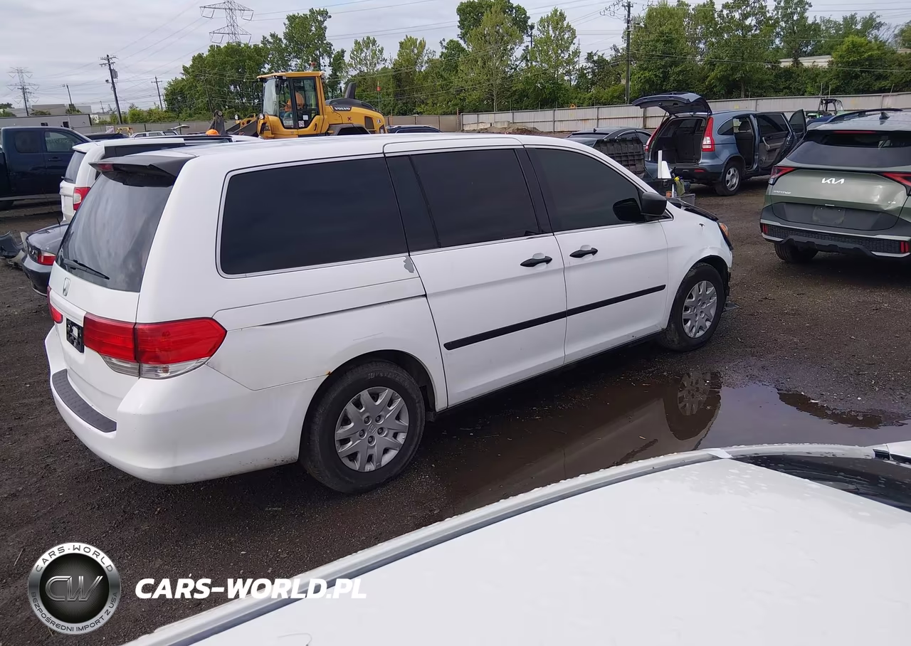 2010 Honda Odyssey Lx VIN:5FNRL3H21AB103128 - 4