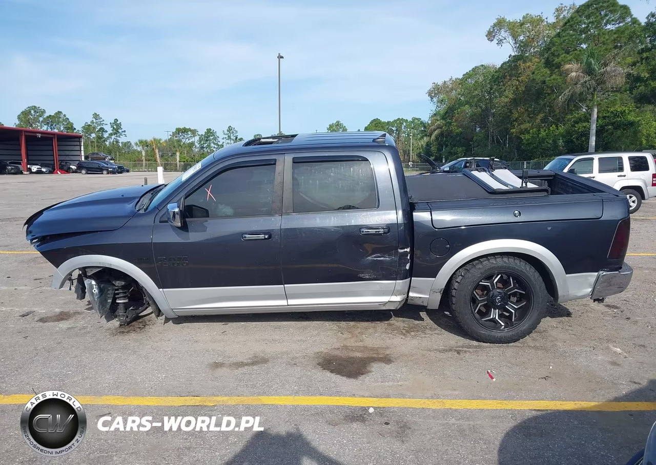 2015 Ram 1500 Laramie VIN:1C6RR7NT8FS500100 - 13
