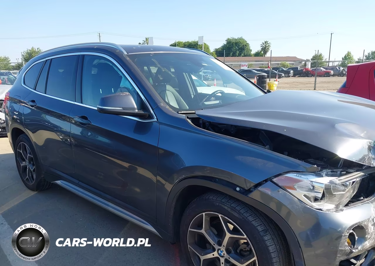 2018 BMW X1 xDrive28I VIN:WBXHT3C33J5L33821 - 14