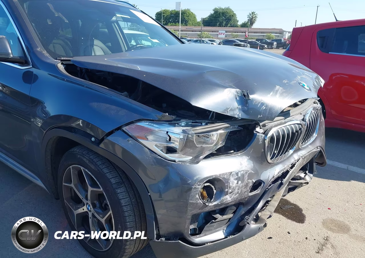 2018 BMW X1 xDrive28I VIN:WBXHT3C33J5L33821 - 18