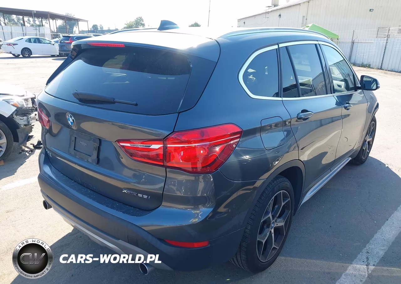 2018 BMW X1 xDrive28I VIN:WBXHT3C33J5L33821 - 4