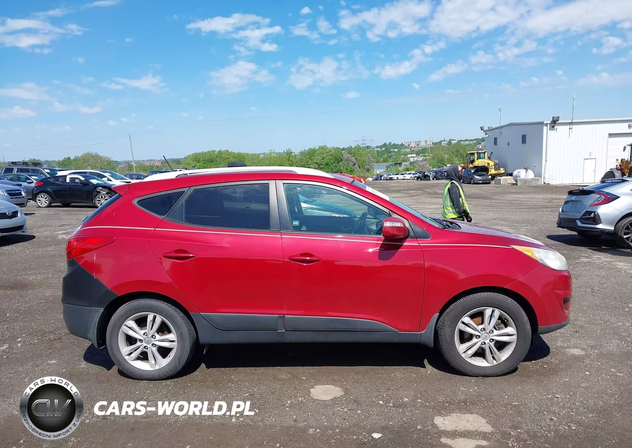 2012 Hyundai Tucson Gls VIN:KM8JUCAC8CU452175 - 13