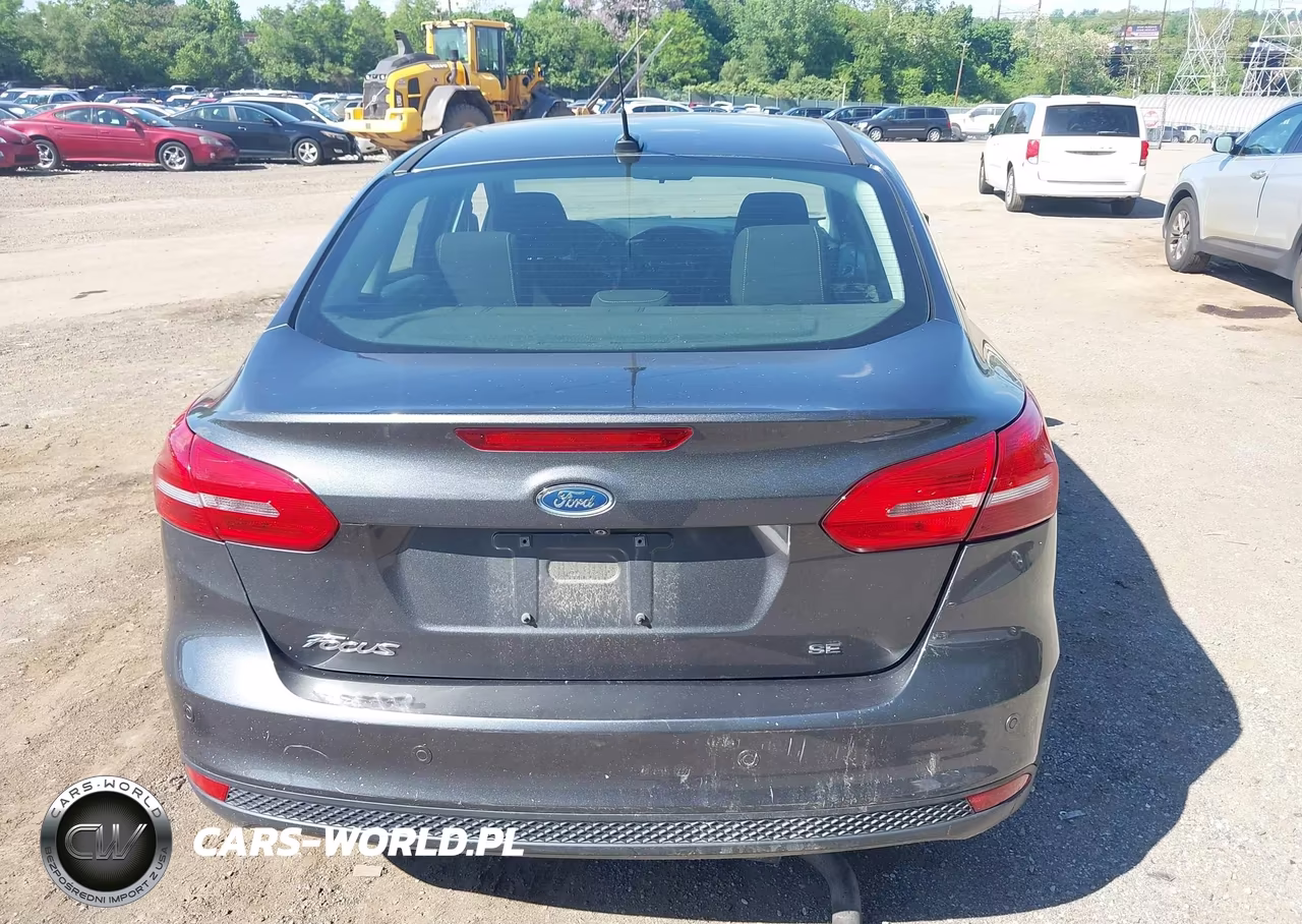 2016 Ford Focus Se VIN:1FADP3F27GL354247 - 16