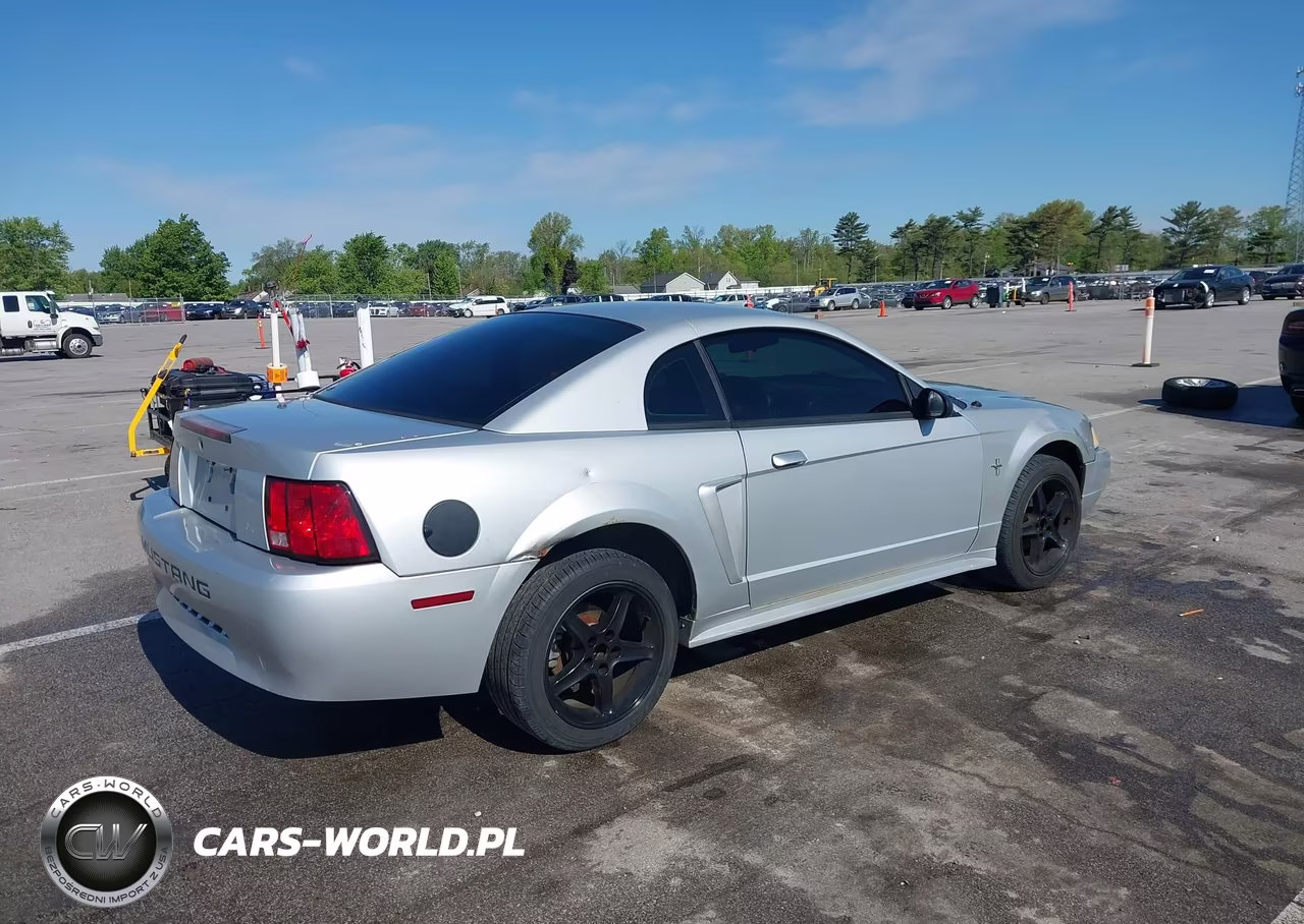 2000 Ford Mustang VIN:1FAFP4043YF230520 - 4