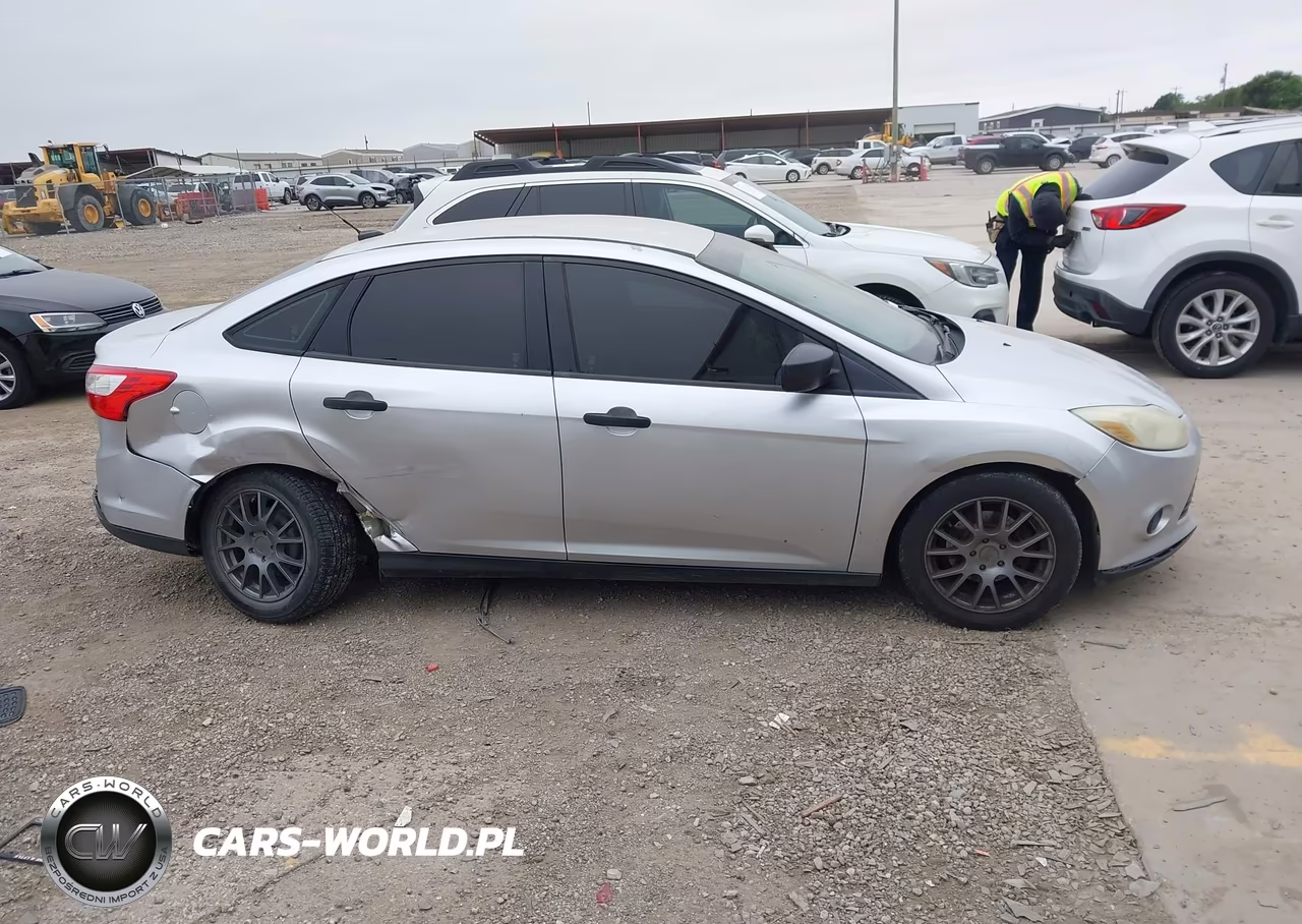 2013 Ford Focus S VIN:1FADP3E21DL309687 - 13