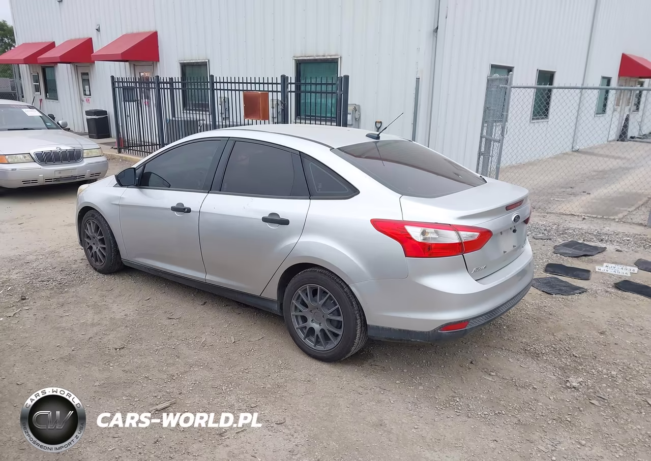 2013 Ford Focus S VIN:1FADP3E21DL309687 - 14