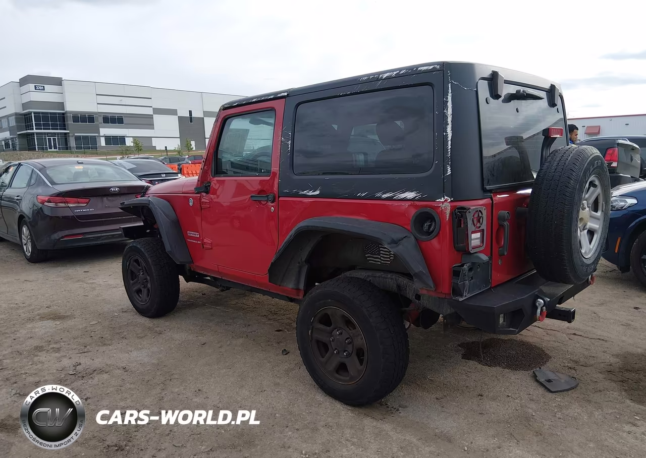 2011 Jeep Wrangler Sport VIN:1J4AA2D14BL636870 - 3