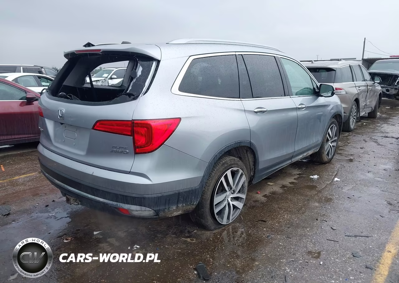 2018 Honda Pilot Elite VIN:5FNYF6H05JB033927 - 4
