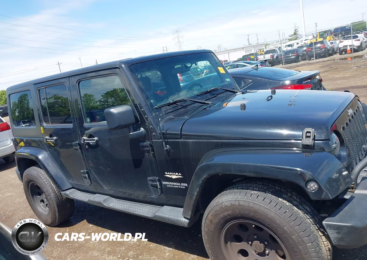 2011 Jeep Wrangler Unlimited Sahara VIN:1J4BA5H10BL635392 - 13