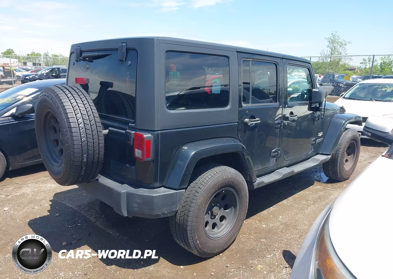 2011 Jeep Wrangler Unlimited Sahara VIN:1J4BA5H10BL635392 - 4