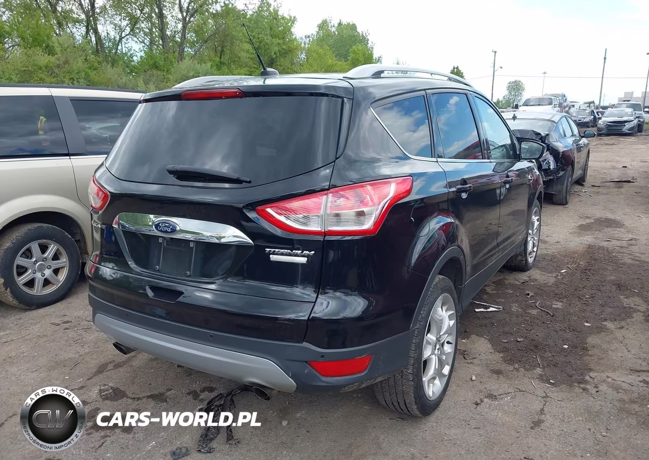2016 Ford Escape Titanium VIN:1FMCU0JX5GUC86701 - 4