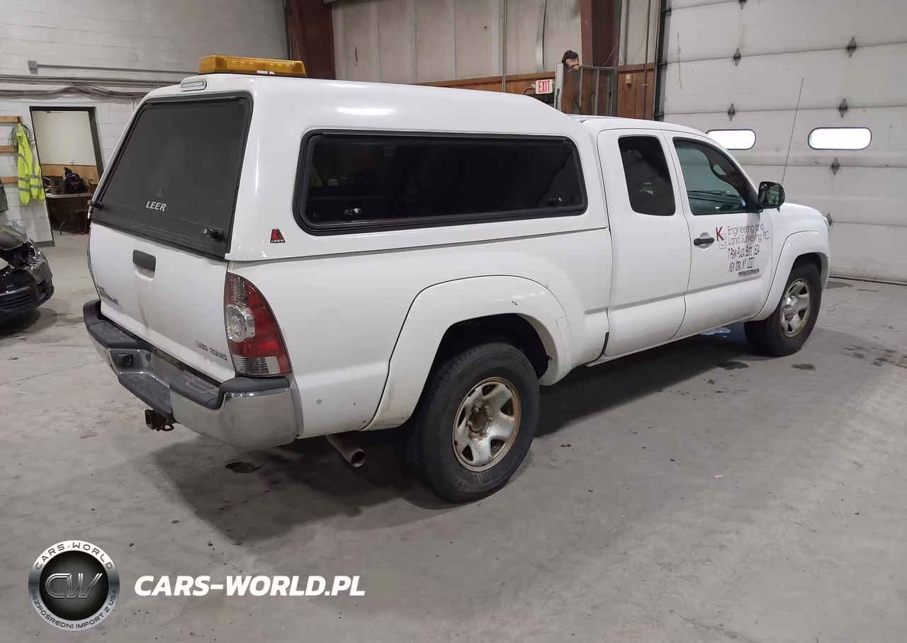 2009 Toyota Tacoma Base V6 VIN:5TEUU42N09Z669971 - 4