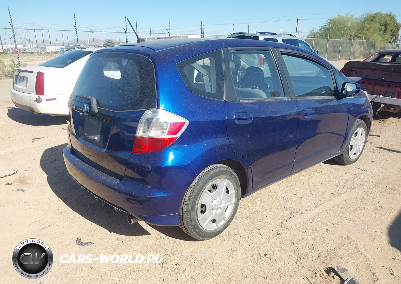2012 Honda Fit VIN:JHMGE8H35CC008173 - 4