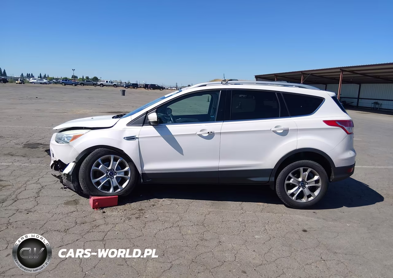 2016 Ford Escape Titanium VIN:1FMCU9J9XGUB02276 - 13