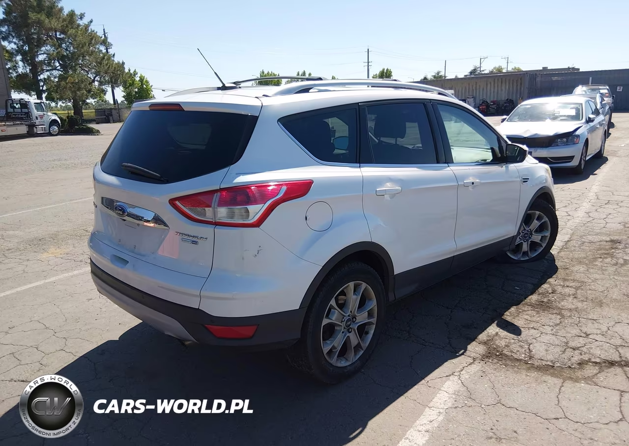 2016 Ford Escape Titanium VIN:1FMCU9J9XGUB02276 - 4