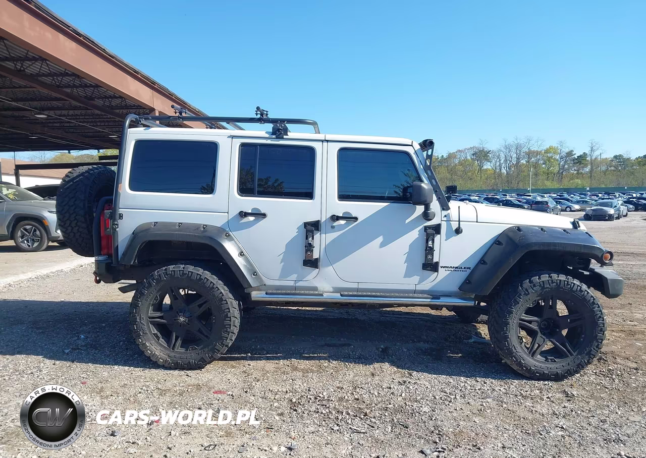 2012 Jeep Wrangler Unlimited Sahara VIN:1C4BJWEG0CL284439 - 13