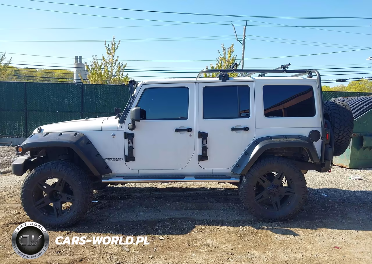 2012 Jeep Wrangler Unlimited Sahara VIN:1C4BJWEG0CL284439 - 14