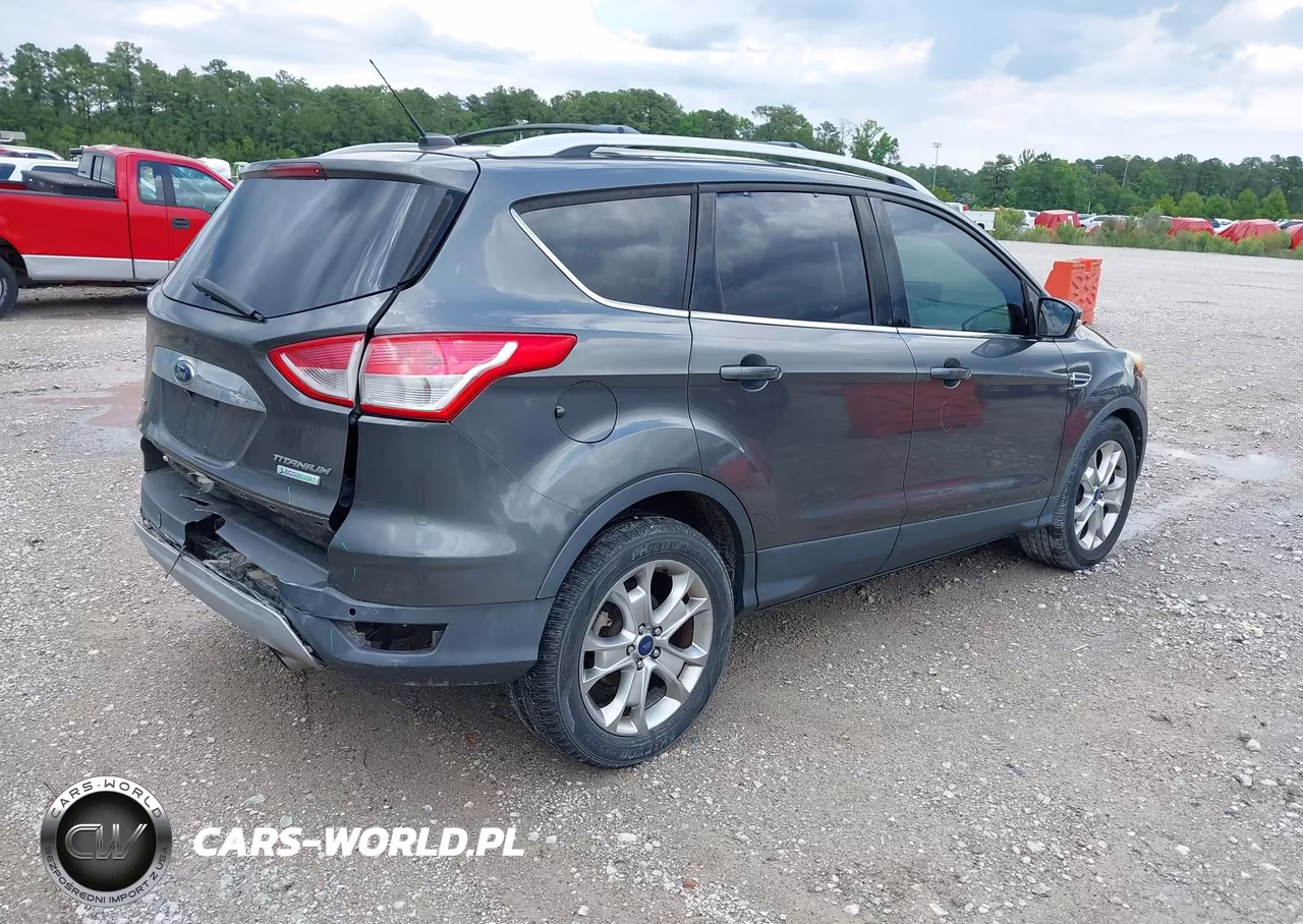 2015 Ford Escape Titanium VIN:1FMCU0J99FUC74132 - 4