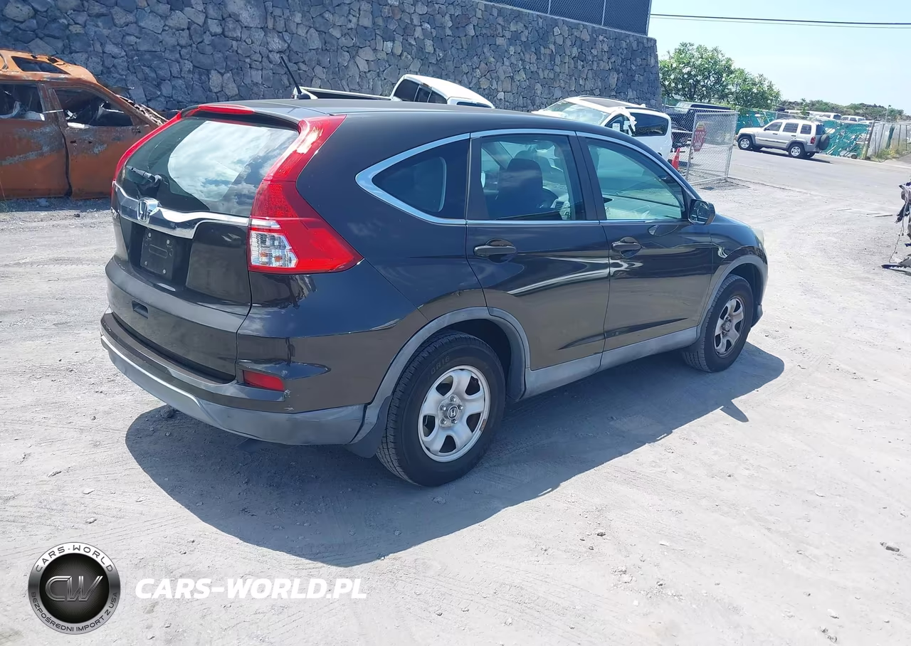 2015 Honda Cr-V Lx VIN:2HKRM3H31FH552386 - 4