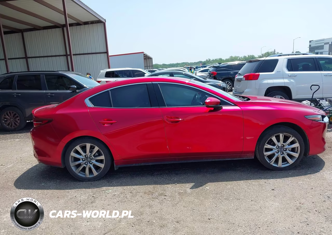 2021 Mazda Mazda3 Premium VIN:JM1BPADL0M1313385 - 13