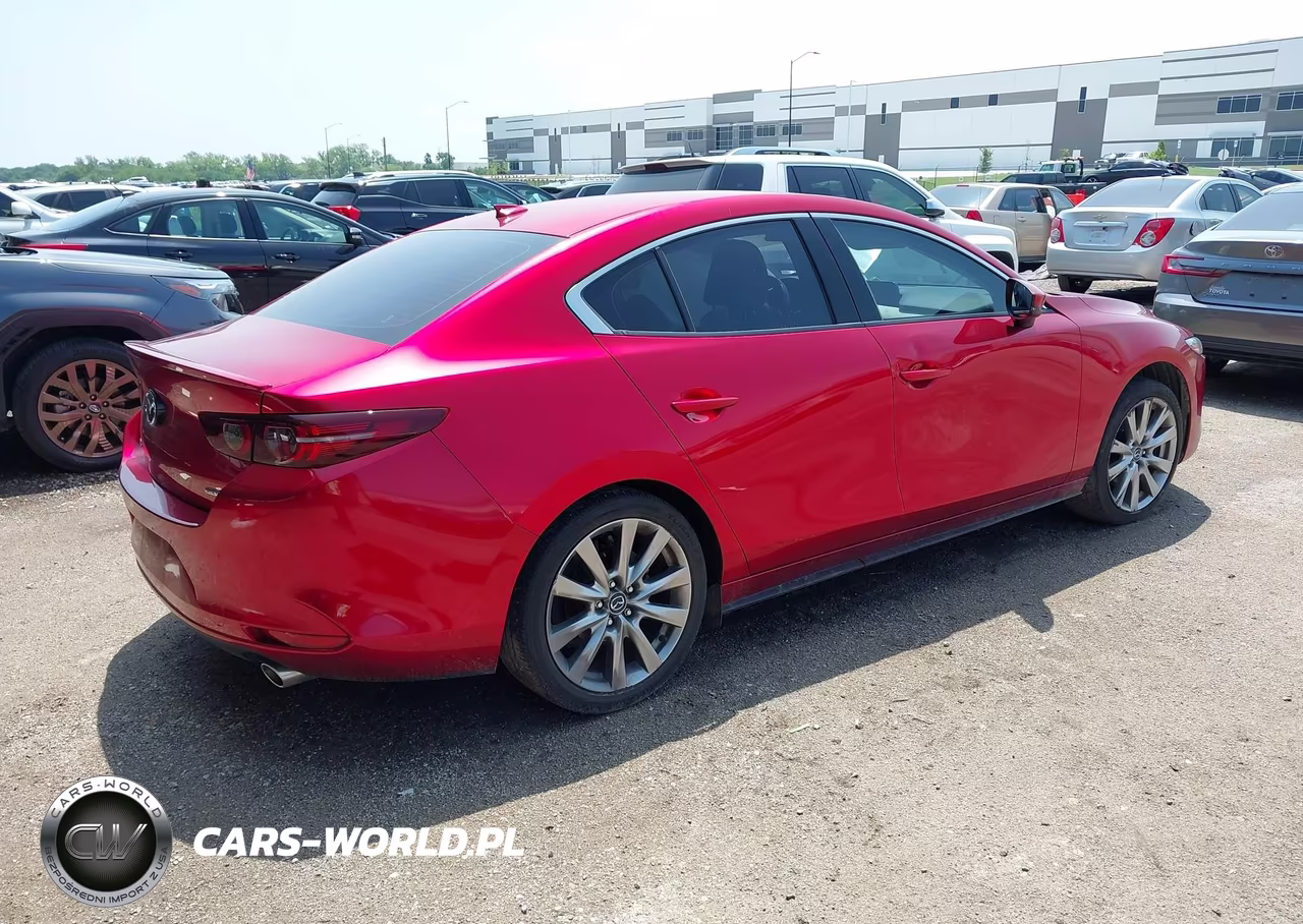 2021 Mazda Mazda3 Premium VIN:JM1BPADL0M1313385 - 4