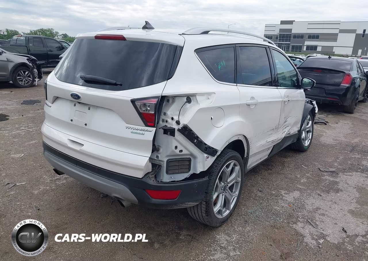 2018 Ford Escape Titanium VIN:1FMCU0J96JUD20394 - 4