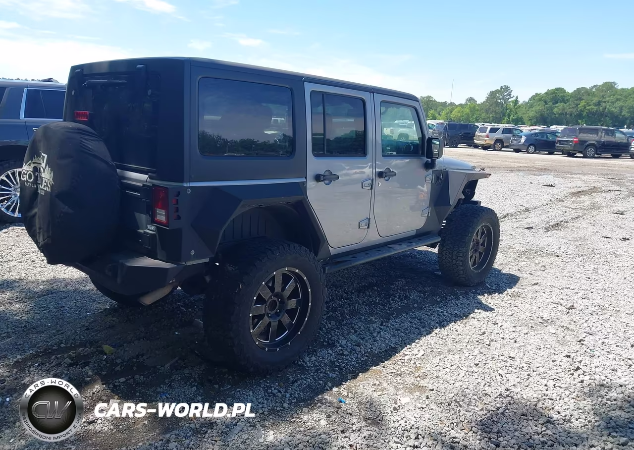2015 Jeep Wrangler Unlimited Freedom Edition VIN:1C4BJWDG9FL563166 - 4