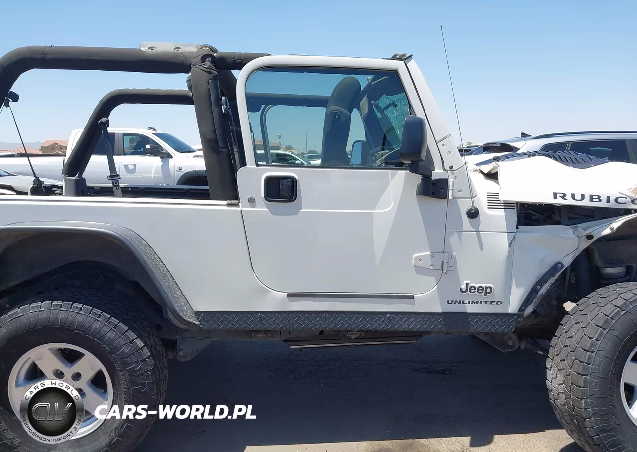2005 Jeep Wrangler Unlimited Rubicon VIN:1J4FA64S45P327385 - 14