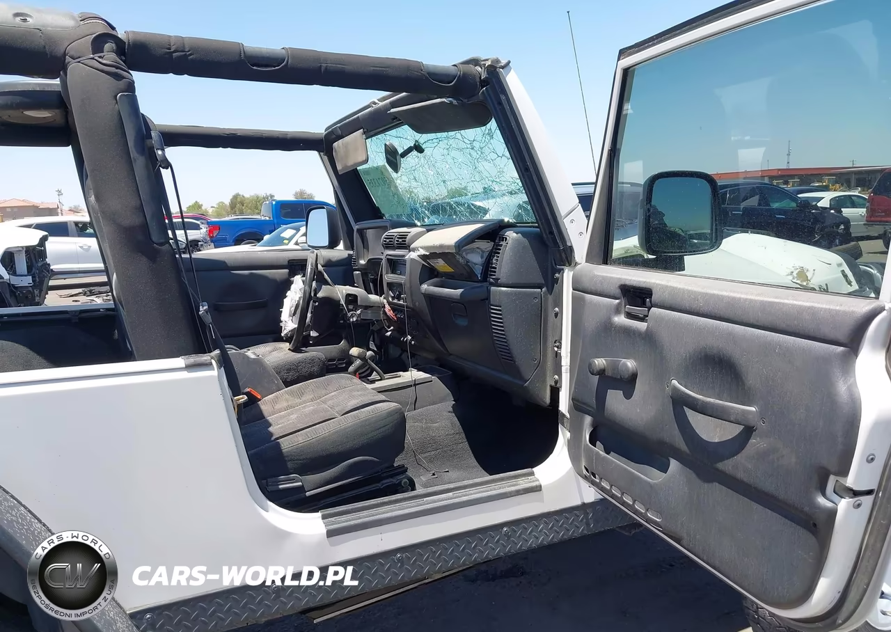 2005 Jeep Wrangler Unlimited Rubicon VIN:1J4FA64S45P327385 - 5