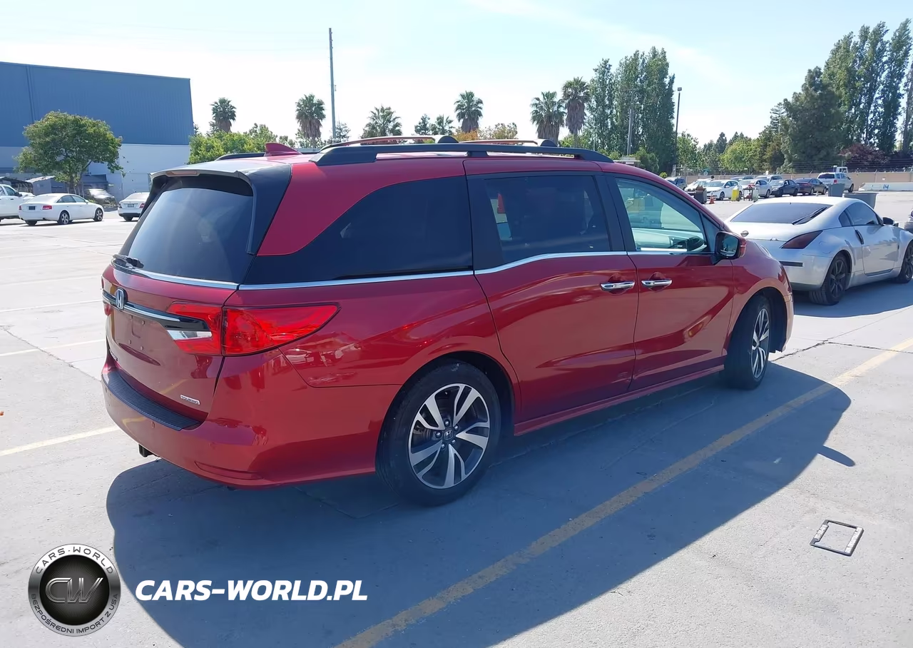 2023 Honda Odyssey Touring VIN:5FNRL6H82PB061664 - 4