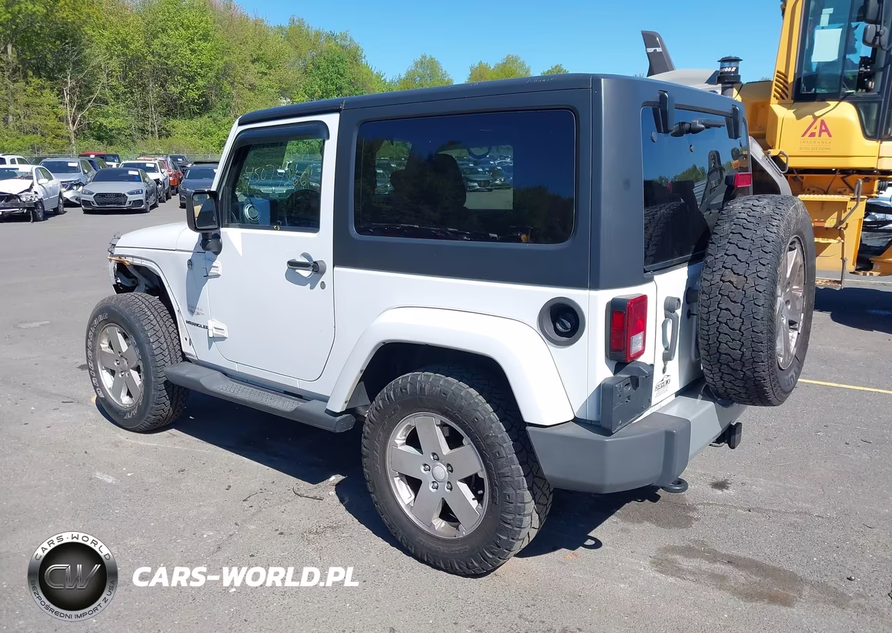 2011 Jeep Wrangler Sahara VIN:1J4AA5D14BL633159 - 3