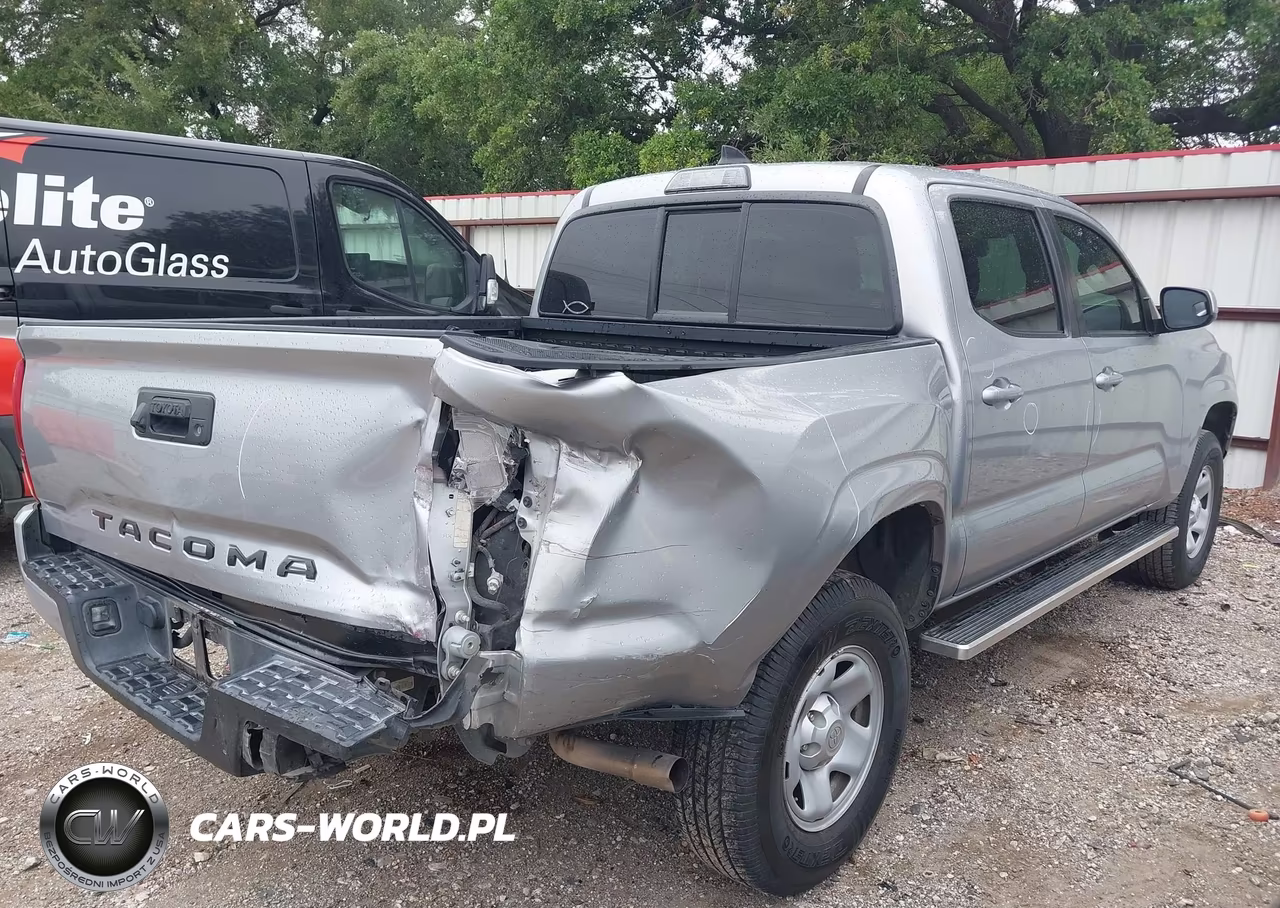 2018 Toyota Tacoma Sr VIN:5TFAX5GN3JX130975 - 4