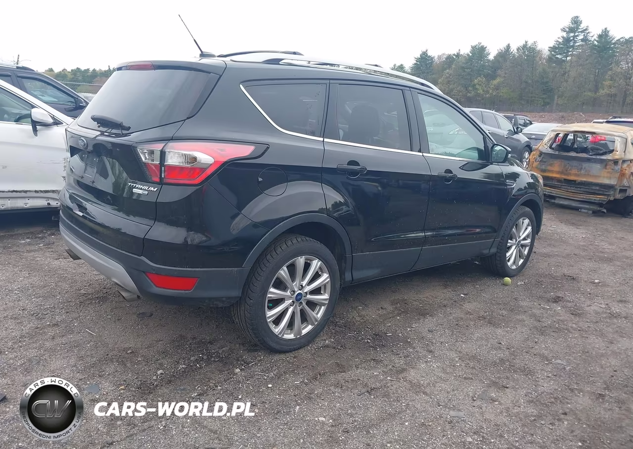 2017 Ford Escape Titanium VIN:1FMCU9JD0HUC69963 - 4