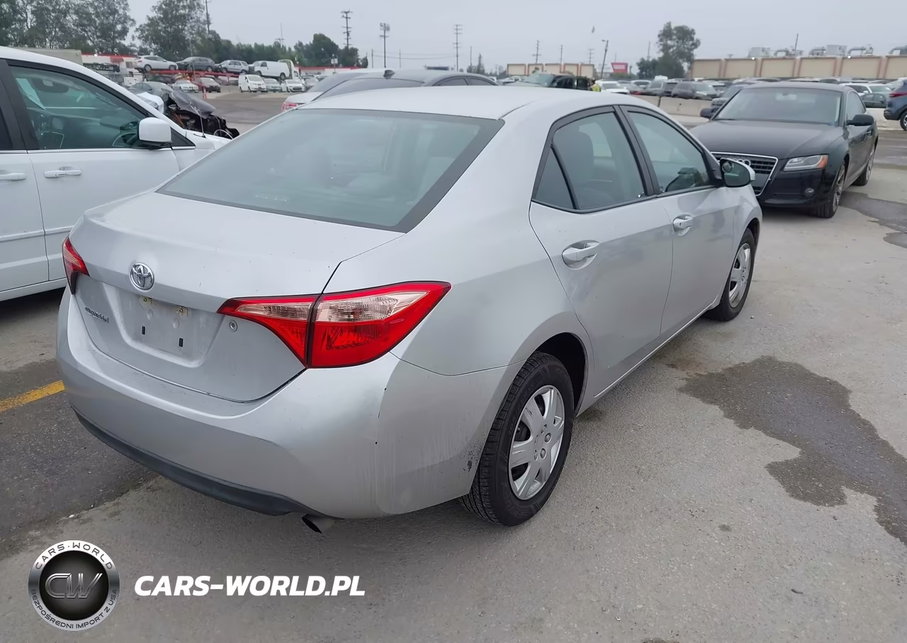 2017 Toyota Corolla L VIN:5YFBURHE4HP617940 - 4