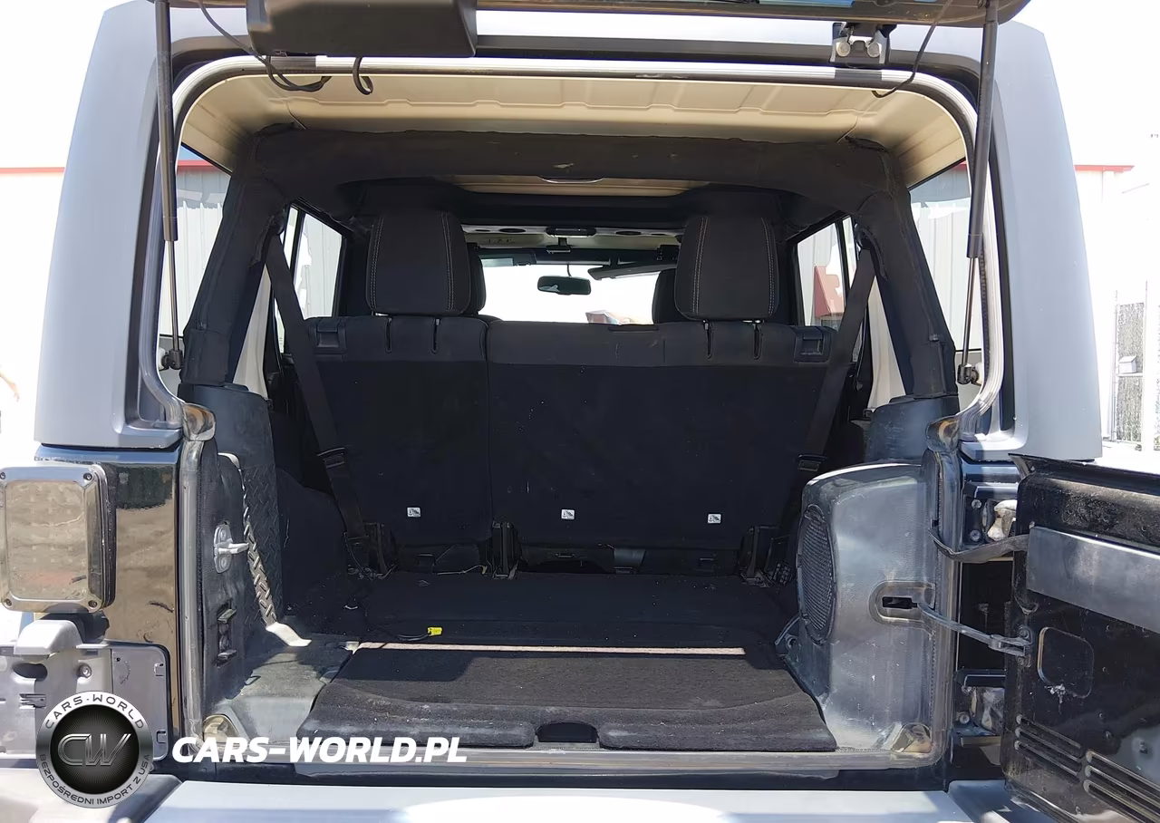 2014 Jeep Wrangler Unlimited Sahara VIN:1C4BJWEG8EL282067 - 16