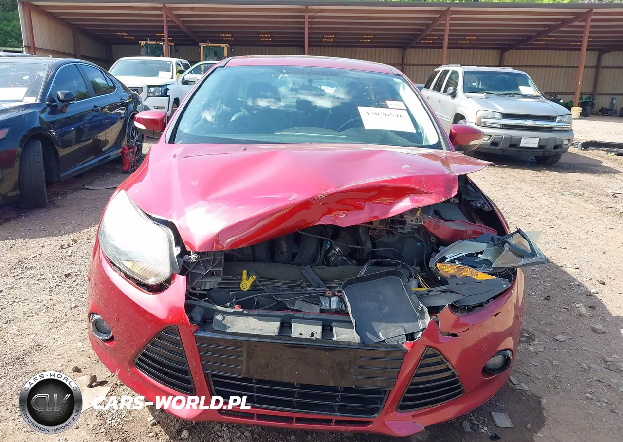 2014 Ford Focus Titanium VIN:1FADP3J27EL103829 - 13
