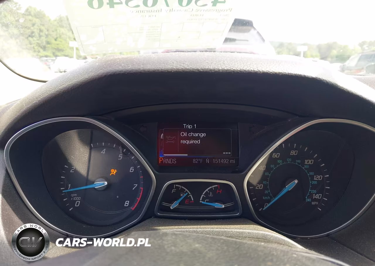 2014 Ford Focus Titanium VIN:1FADP3J27EL103829 - 7