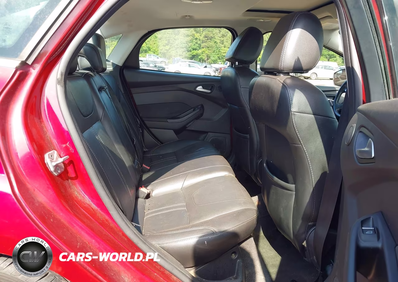 2014 Ford Focus Titanium VIN:1FADP3J27EL103829 - 8