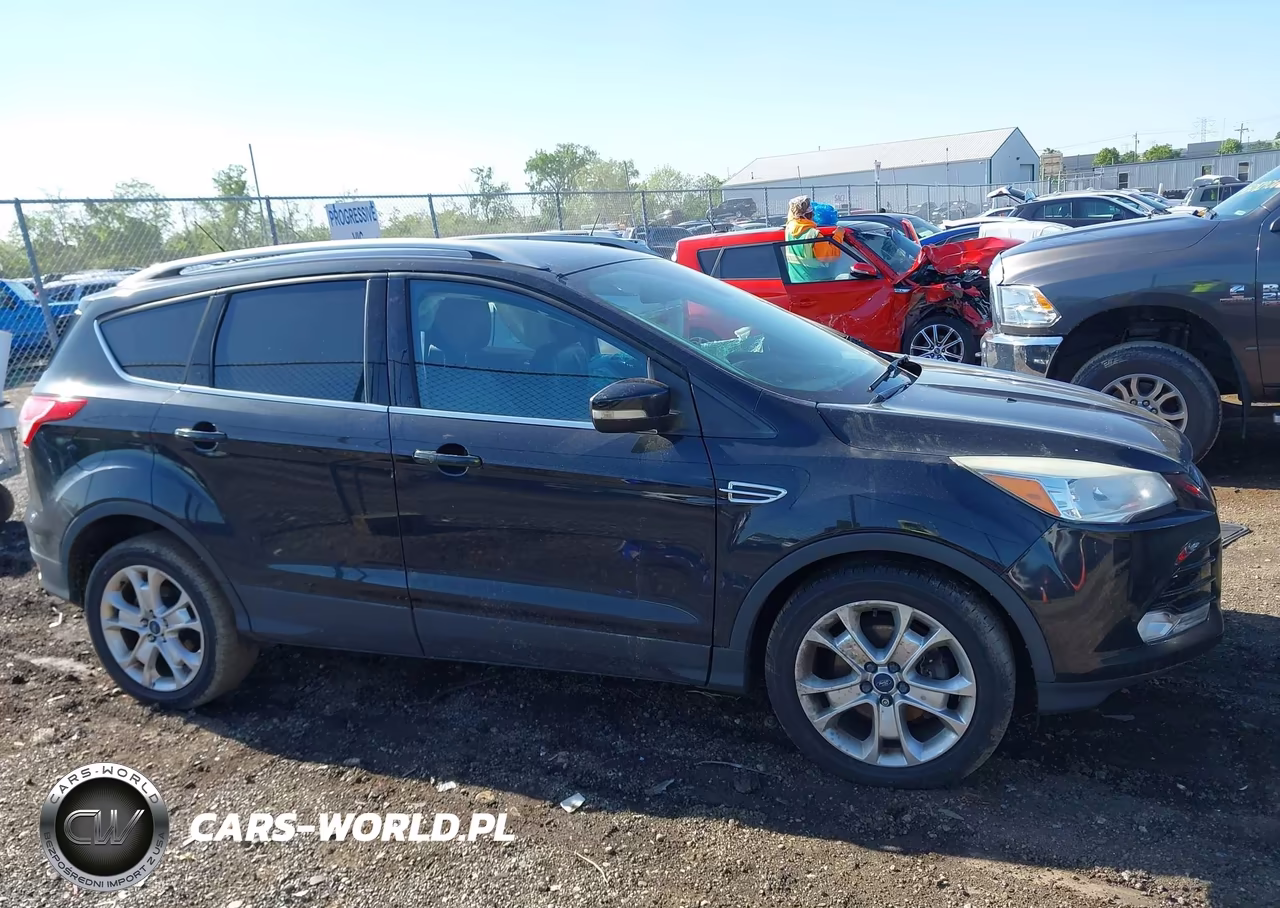 2015 Ford Escape Titanium VIN:1FMCU0J97FUC41629 - 13