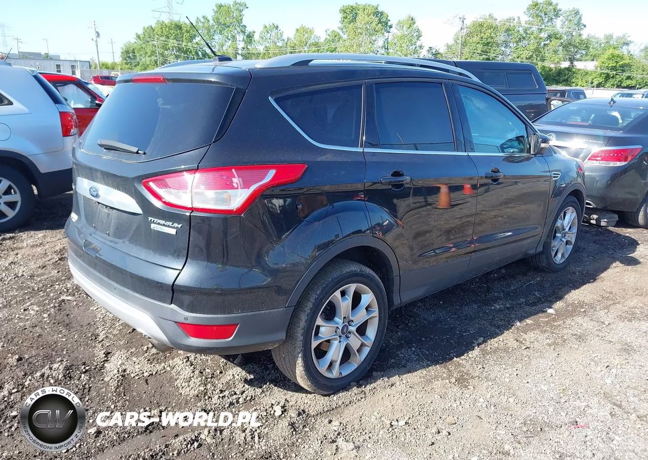2015 Ford Escape Titanium VIN:1FMCU0J97FUC41629 - 4
