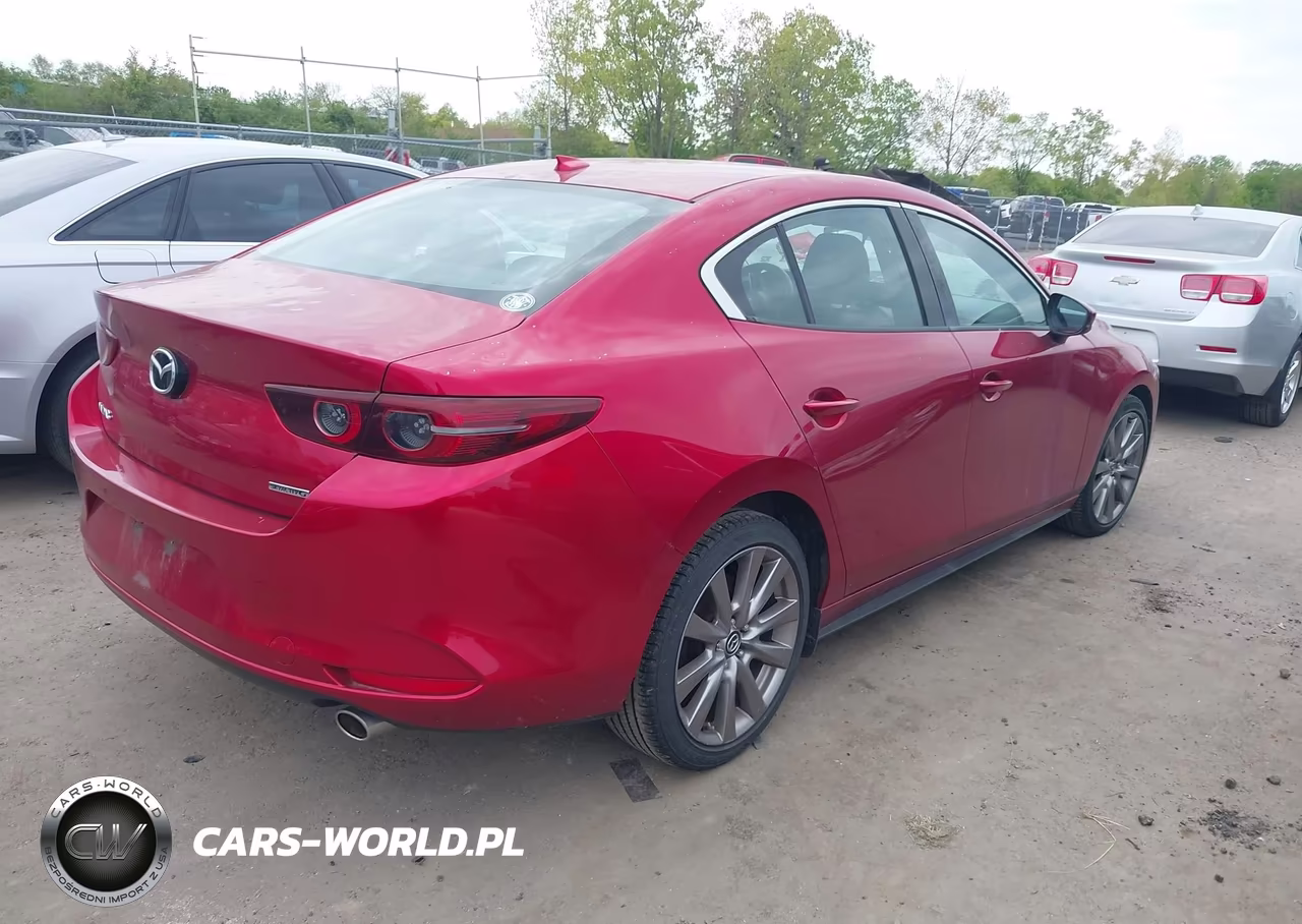 2019 Mazda Mazda3 Premium Package VIN:3MZBPAEM9KM103565 - 4