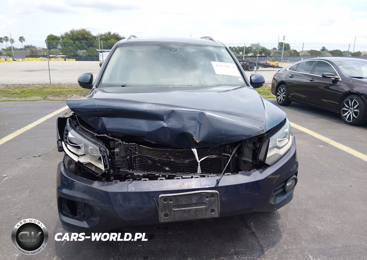2012 Volkswagen Tiguan Sel VIN:WVGAV7AX0CW583600 - 13