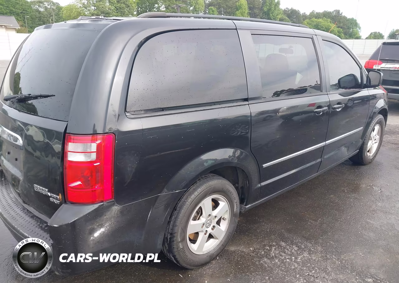 2010 Dodge Grand Caravan Sxt VIN:2D4RN5D13AR409547 - 4