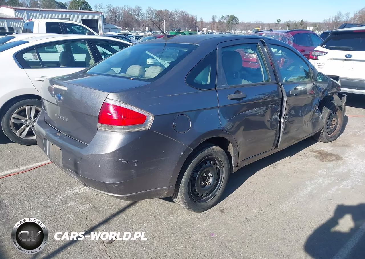 2011 Ford Focus S VIN:1FAHP3ENXBW176659 - 4