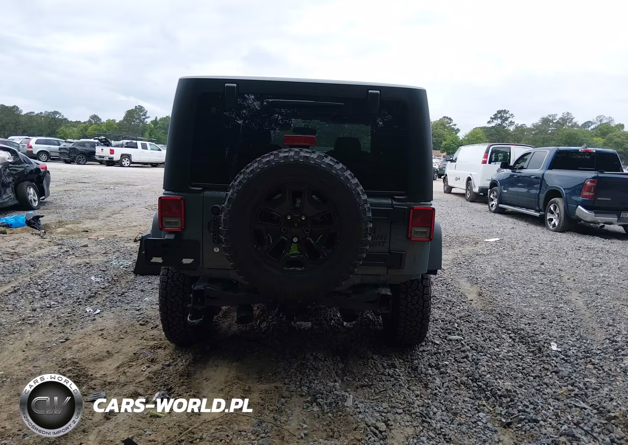 2014 Jeep Wrangler Willys Wheeler VIN:1C4AJWAG9EL244509 - 17