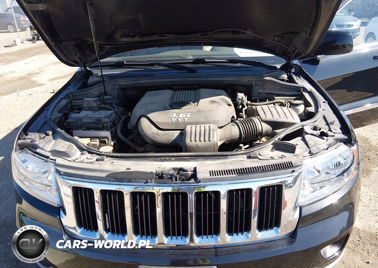 2012 Jeep Grand Cherokee Laredo VIN:1C4RJFAG2CC302931 - 10