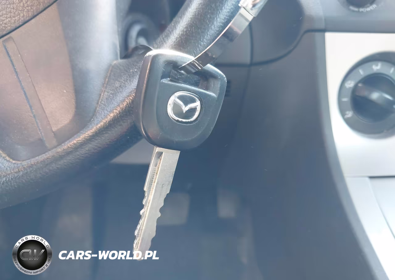 2011 Mazda Mazda3 I Sport VIN:JM1BL1UF7B1902033 - 11