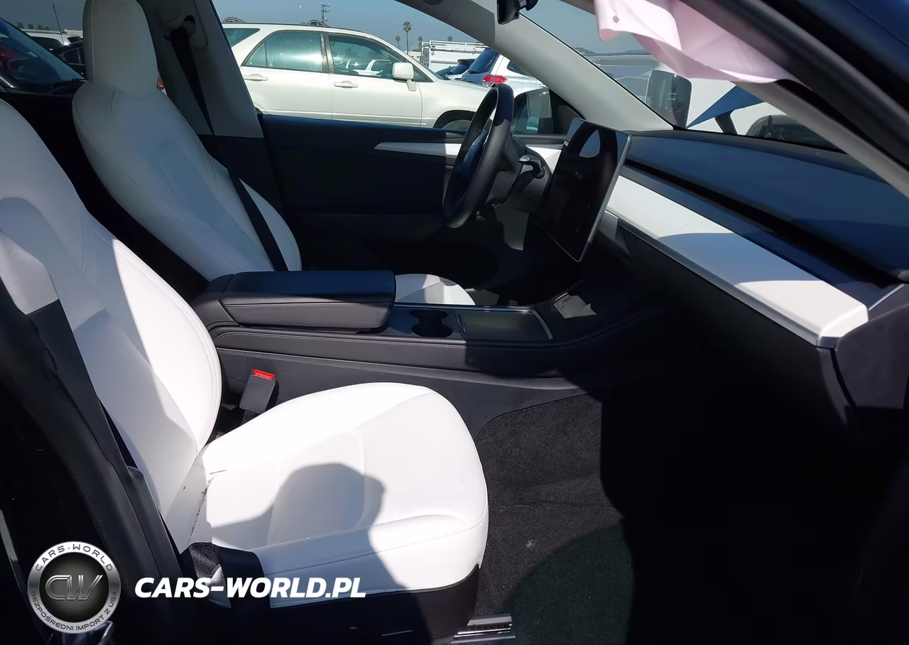2023 Tesla Model Y Performance Dual Motor All-Wheel Drive VIN:7SAYGDEF4PF624014 - 5