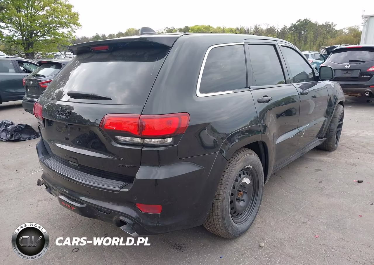 2015 Jeep Grand Cherokee Srt-8 VIN:1C4RJFDJ9FC792067 - 4