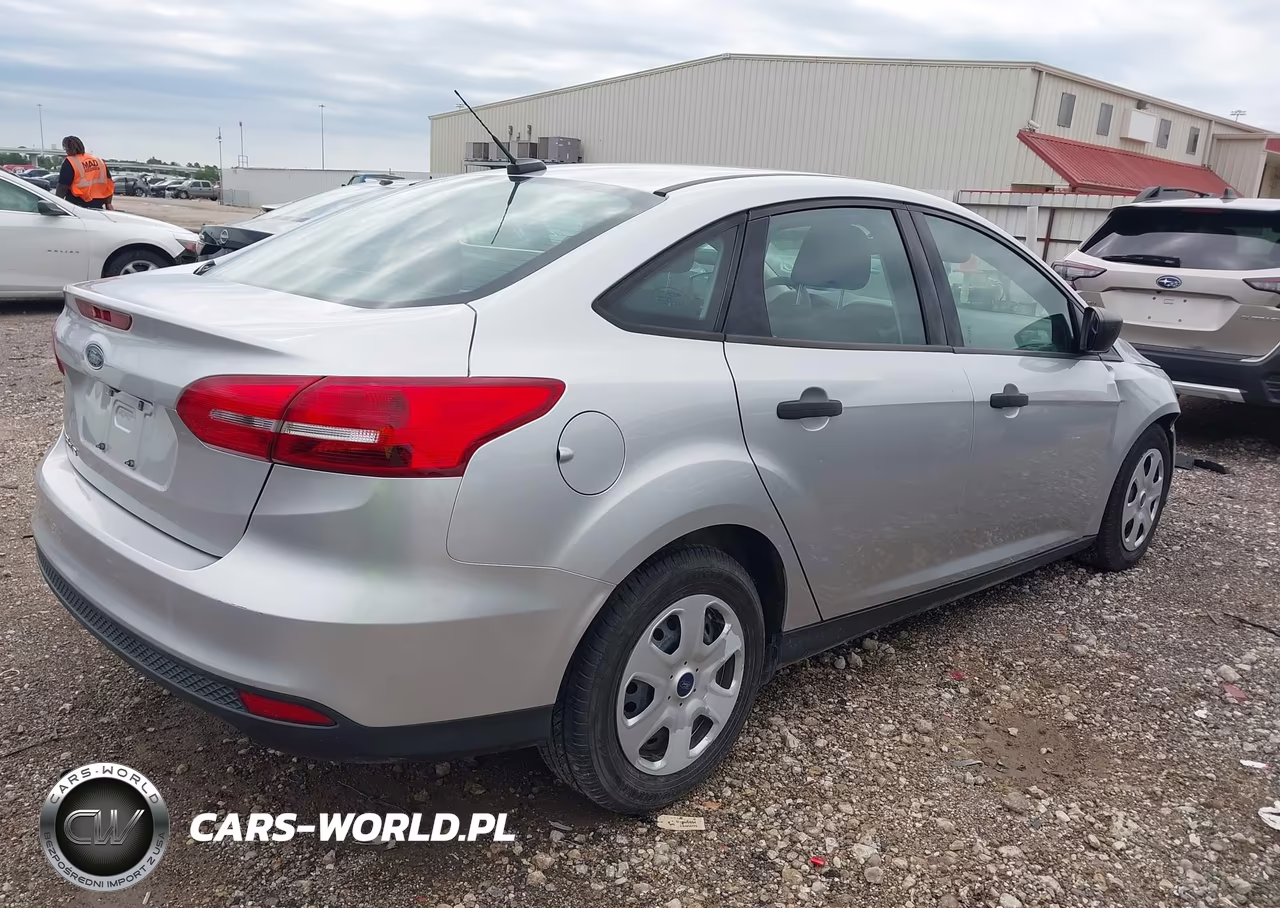 2017 Ford Focus S VIN:1FADP3E21HL342372 - 4